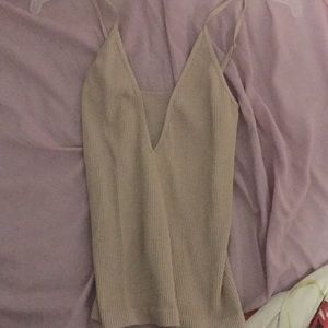 Free people tank lightly worn. Bought few years ago so it’s not on site anymore